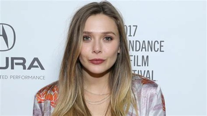 Elizabeth Olsen Suffers a Wardrobe Malfunction Thanks to Enemy No. 1: The Wind